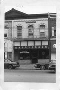 151 E MAIN ST, a Commercial Vernacular small retail building, built in Stoughton, Wisconsin in 1889.