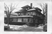 416-418 N CARROLL ST, a American Foursquare house, built in Madison, Wisconsin in 1914.