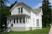 1500 WISCONSIN AVE, a Gabled Ell house, built in New Holstein, Wisconsin in 1890.