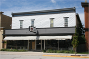 2105 MAIN ST, a Commercial Vernacular large retail building, built in New Holstein, Wisconsin in 1906.
