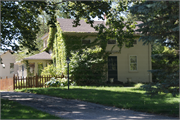 205 E MADISON AVE, a Greek Revival house, built in Milton, Wisconsin in 1853.