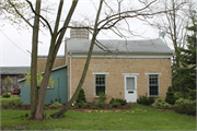 W140 STATE HIGHWAY 11, a Greek Revival house, built in Spring Prairie, Wisconsin in 1844.