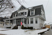 209 KENDALL, a Dutch Colonial Revival house, built in Burlington, Wisconsin in .