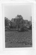 E SIDE OF HAWKINSON RD, .3 M N OF TOWNLINE RD, a Queen Anne house, built in Dunn, Wisconsin in 1892.