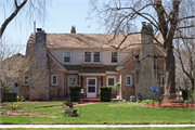 4225 N Downer Ave, a Dutch Colonial Revival house, built in Shorewood, Wisconsin in 1922.