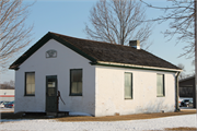 449 Beloit Street, a Front Gabled one to six room school, built in Burlington, Wisconsin in 1840.