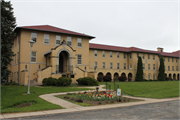 2457 BROWNS LAKE DR, a Romanesque Revival religious residence, built in Burlington, Wisconsin in 1930.