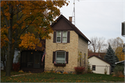 308 S KANE ST, a Gabled Ell house, built in Burlington, Wisconsin in 1857.