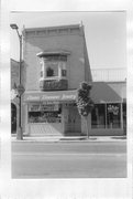 209-211 E MAIN ST, a Commercial Vernacular retail building, built in Sun Prairie, Wisconsin in 1899.