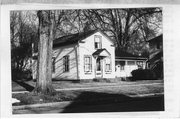 408 W WASHINGTON ST, a Gabled Ell house, built in Stoughton, Wisconsin in 1859.