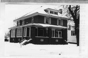 125 S MONROE ST, a American Foursquare house, built in Stoughton, Wisconsin in 1915.