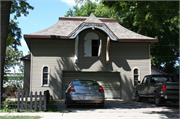 133 W DIVISION ST, a Second Empire carriage house, built in Fond du Lac, Wisconsin in 1870.
