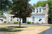 628 N PORT WASHINGTON RD, a Greek Revival house, built in Grafton, Wisconsin in 1874.