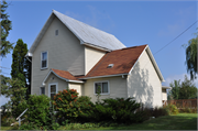 217 Front Street, a Gabled Ell house, built in Cashton, Wisconsin in 1910.