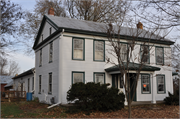 7105 NORTHWEST HWY, a Greek Revival house, built in Mukwonago (village), Wisconsin in 1858.