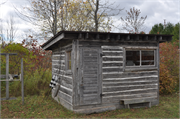 SE CORNER OF STATE HIGHWAY 42/57 & MICHIGAN ST, a Astylistic Utilitarian Building fishing shed, built in Sturgeon Bay, Wisconsin in 1920.