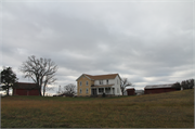 W114 HOOPER ROAD, a Gabled Ell house, built in Palmyra, Wisconsin in 1845.