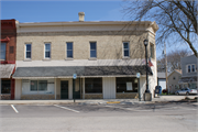 228-230 MERCHANT ROW, a Commercial Vernacular large retail building, built in Milton, Wisconsin in 1897.