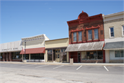 218-220 MERCHANT ROW, a Commercial Vernacular retail building, built in Milton, Wisconsin in 1899.