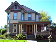 1222 11TH ST, a Queen Anne house, built in Monroe, Wisconsin in 1880.