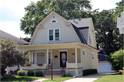 900 S. Eighth St., a Dutch Colonial Revival house, built in Watertown, Wisconsin in 1913.