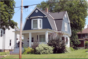 905 S. Fifth St., a Dutch Colonial Revival house, built in Watertown, Wisconsin in 1924.