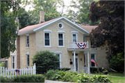 601 Clyman St., a Gabled Ell house, built in Watertown, Wisconsin in 1876.