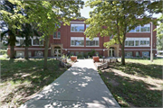 1310 S GRAND AVE (AKA 116-166 SCHOOL ST), a Late Gothic Revival elementary, middle, jr.high, or high, built in Schofield, Wisconsin in 1923.