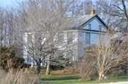 7105 NORTHWEST HWY, a Greek Revival house, built in Mukwonago (village), Wisconsin in 1858.