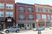 516 COLLEGE AVE, a Commercial Vernacular small retail building, built in Racine, Wisconsin in 1913.