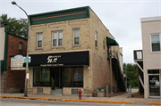 104 E MAIN ST / STATE HIGHWAY 20, a Commercial Vernacular grocery store/supermarket, built in Waterford, Wisconsin in 1907.