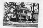 203 E PROSPECT ST, a Arts and Crafts house, built in Stoughton, Wisconsin in 1913.