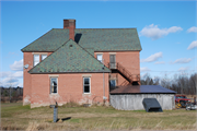 N4907 COUNTY HIGHWAY D, N SIDE OF UNITED STATES HIGHWAY 8 AT NW CNR W/ COUNTY HIGHWAY D NORTH, a Other Vernacular one to six room school, built in Knox, Wisconsin in 1912.