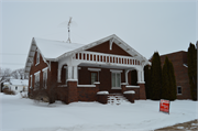 133 N Main St, a Craftsman house, built in Loyal, Wisconsin in 1915.