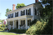 340 S MAIN ST, a Greek Revival house, built in Lake Mills, Wisconsin in 1843.