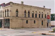 1001-1005 16TH AVE, a Italianate retail building, built in Monroe, Wisconsin in 1872.