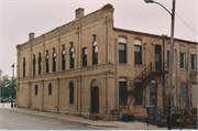 1001-1005 16TH AVE, a Italianate small retail building, built in Monroe, Wisconsin in 1872.