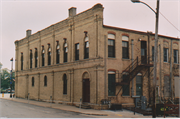 1001-1005 16TH AVE, a Italianate retail building, built in Monroe, Wisconsin in 1872.