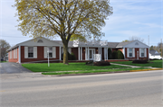 405 W MAIN ST, a Colonial Revival/Georgian Revival funeral home, built in Waupun, Wisconsin in 1961.