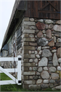 McFarlane, Harold J. and Agnes, Stone House and Barn, a Building.