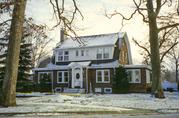 1118 GRACE ST, a Dutch Colonial Revival house, built in Janesville, Wisconsin in 1922.