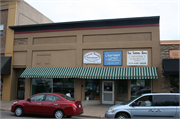 208 S MAIN ST, a Commercial Vernacular large retail building, built in River Falls, Wisconsin in 1919.