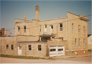 705 N WATER ST, a Commercial Vernacular retail building, built in Lomira, Wisconsin in 1913.