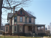 1222 11TH ST, a Queen Anne house, built in Monroe, Wisconsin in 1880.
