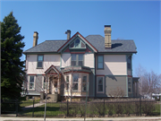 1222 11TH ST, a Queen Anne house, built in Monroe, Wisconsin in 1880.
