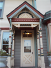 1222 11TH ST, a Queen Anne house, built in Monroe, Wisconsin in 1880.