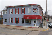 200 5TH AVENUE, a Italianate small retail building, built in New Glarus, Wisconsin in 1880.