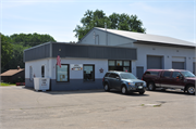 310 N WEBSTER AVE, a Commercial Vernacular gas station/service station, built in Omro, Wisconsin in .