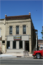 201 N MAIN ST, a Commercial Vernacular small retail building, built in Lake Mills, Wisconsin in 1881.
