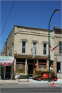 135 N MAIN ST, a Commercial Vernacular small retail building, built in Lake Mills, Wisconsin in 1876.